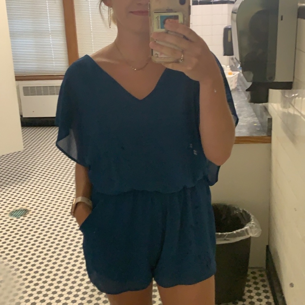 Royal blue romper with pockets!